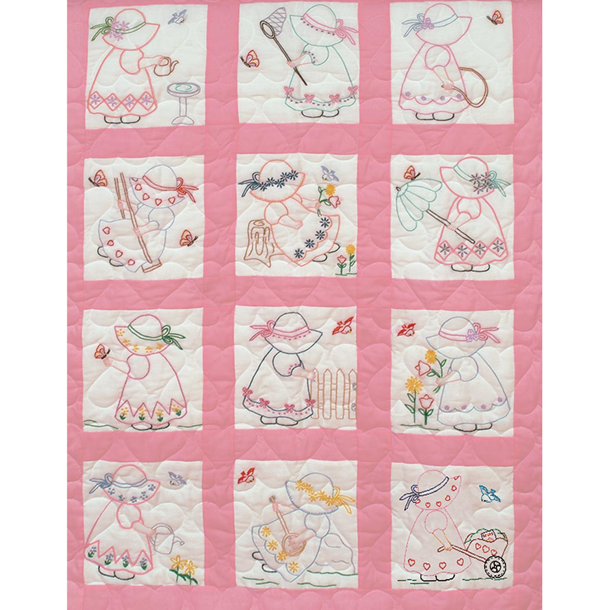 Pink and pastel quilt blocks designed for a baby girl's nursery, showcasing floral motifs and classic patchwork.