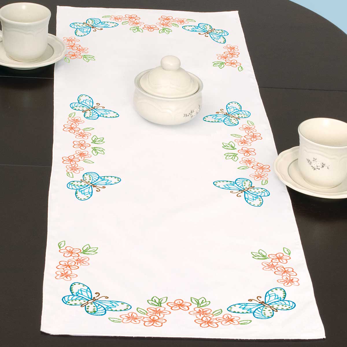 Butterflies & Flowers Table Runner Kit for Hand Embroidery, featuring a preprinted design of colorful butterflies and blooming flowers on a table runner ready for custom stitching and seasonal home décor.