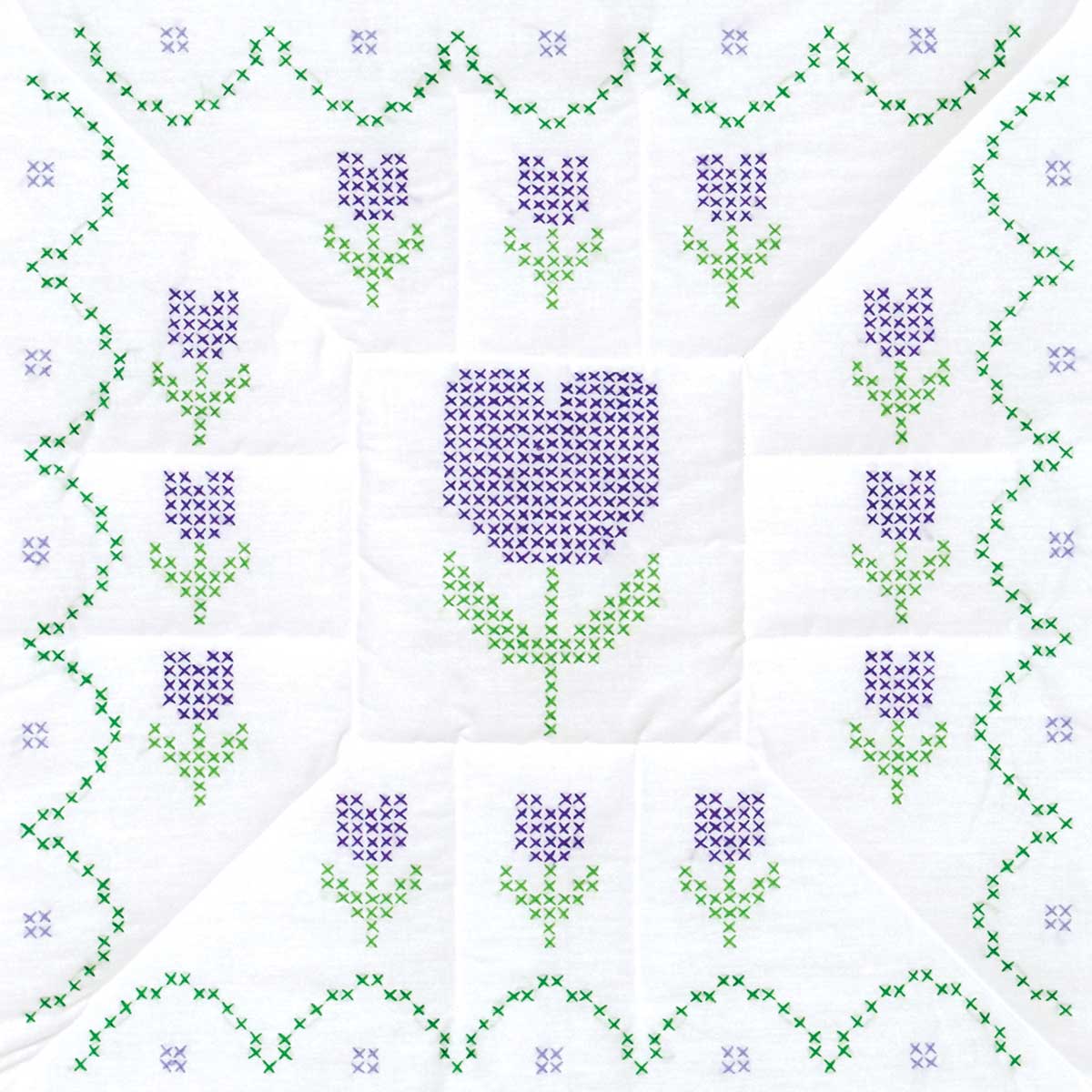 Cross-Stitch Tulips 18-Inch Quilt Blocks for Hand Embroidery, featuring preprinted tulip floral designs on quilt blocks ready for custom cross-stitch stitching and quilting projects.